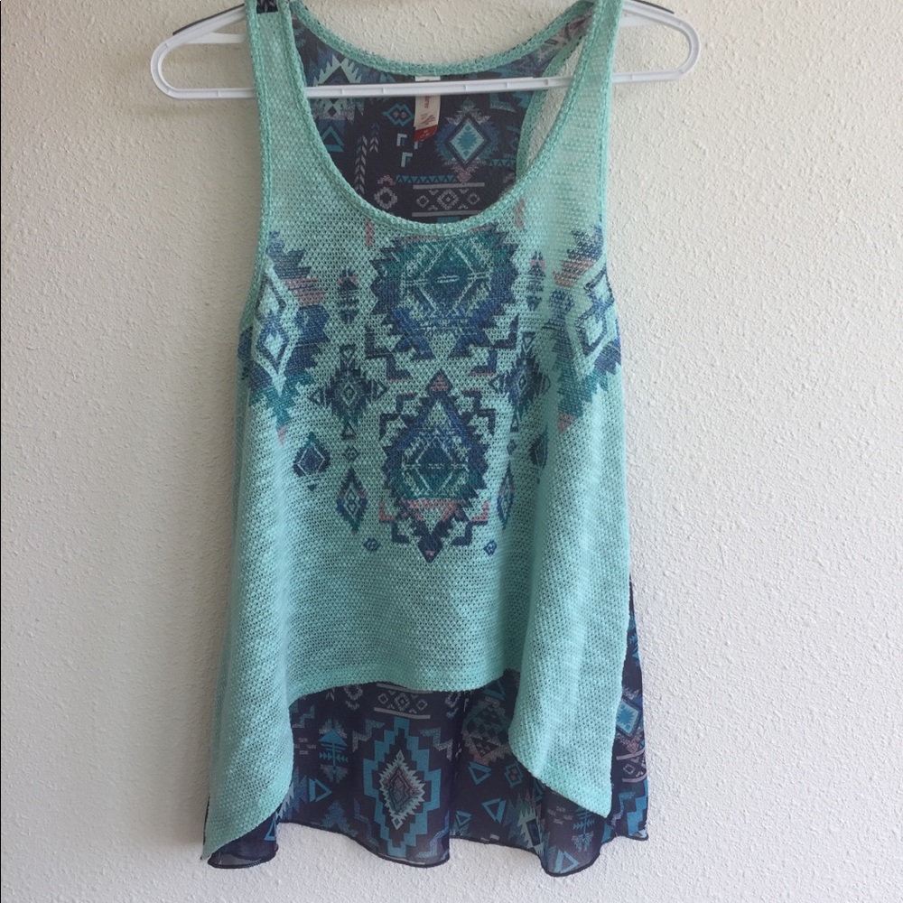 Amazonian printed high low tank top.